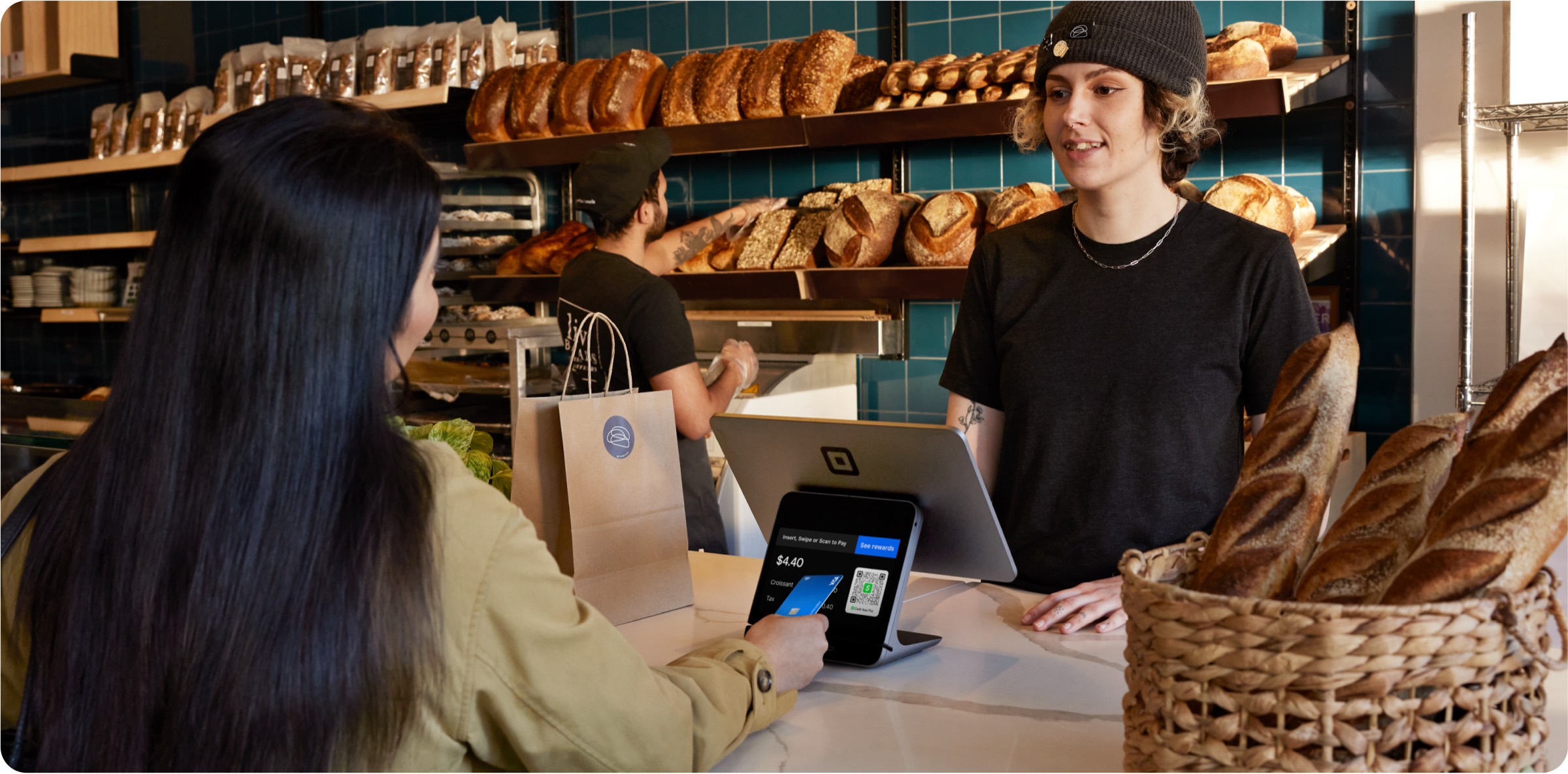 A merchant using an in-person till